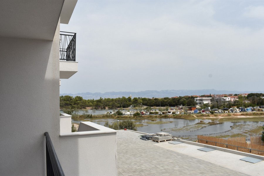 Moderne Reihenhäuser nahe dem Meer in Kroatien zum Verkauf - Immobilienmakler: Panorama Scouting.