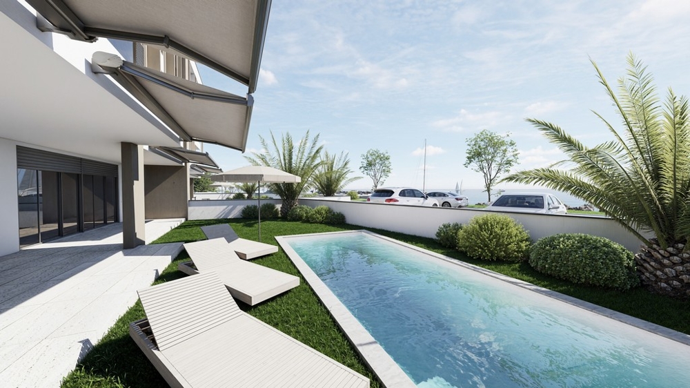 Erdgeschosswohnung mit Pool im Neubau direkt am Meer zum Verkauf - Panorama Scouting.
